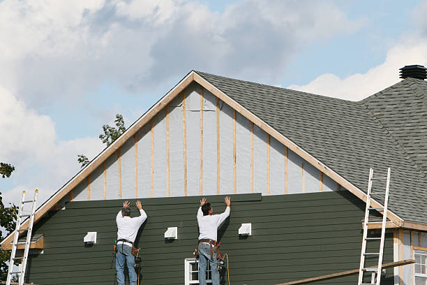 Professional Siding Installation technician working in Hawk Run, PA